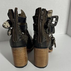 Freebirds by Steven.  Back zipper, buckles, heels, leather.